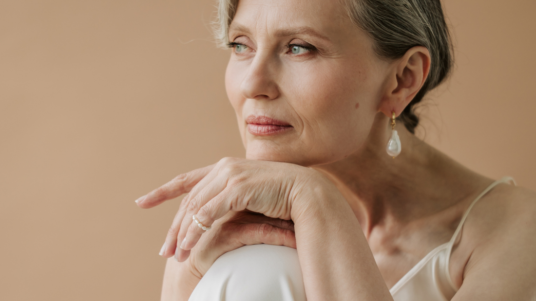 Woman in midlife illustrating dry skin and skincare changes during menopause